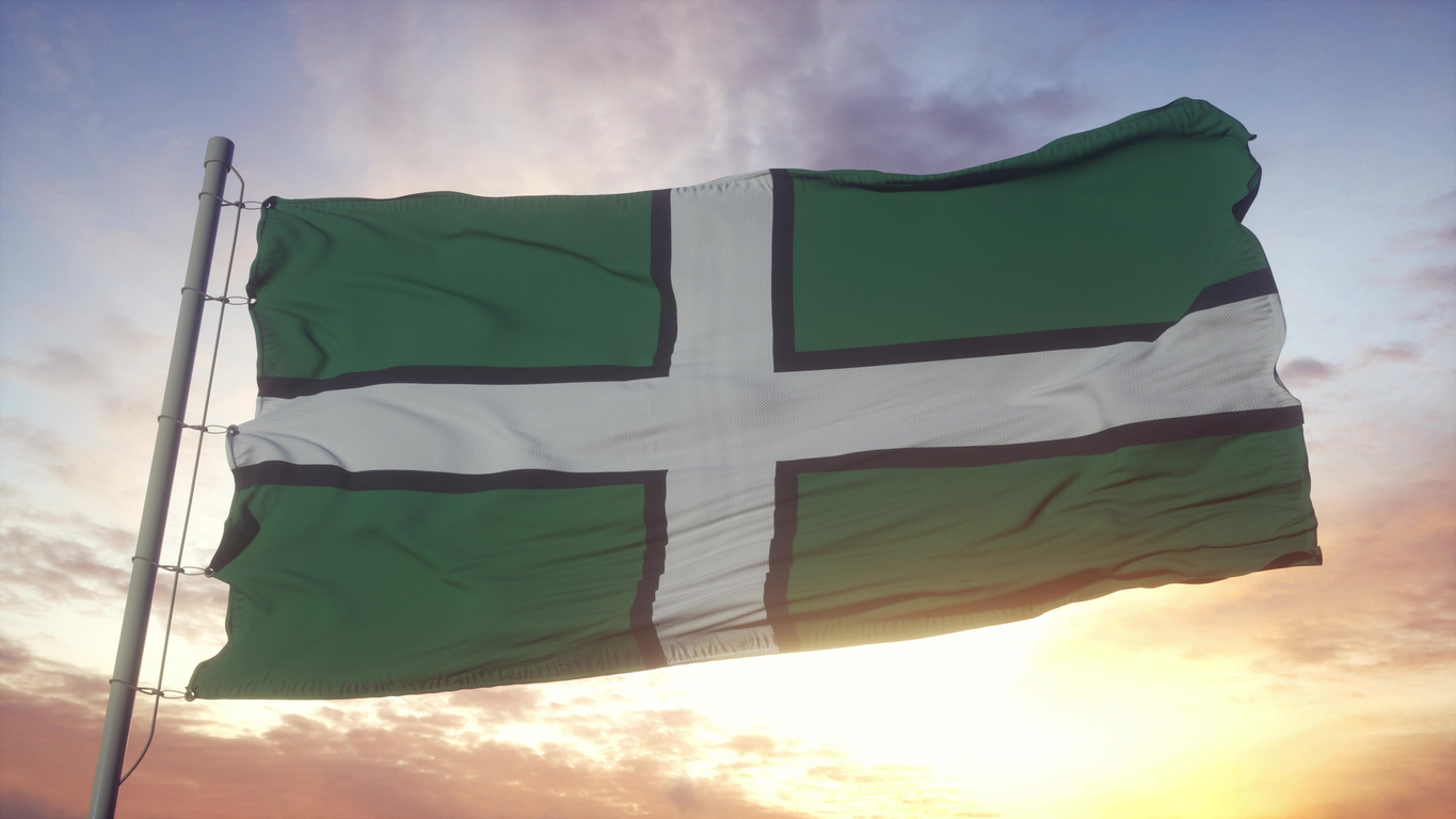 Devon flag, England, waving in the wind, sky and sun background. 3d rendering.