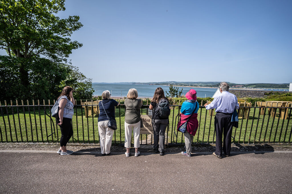 Group of people on a walking tour in Exmouth