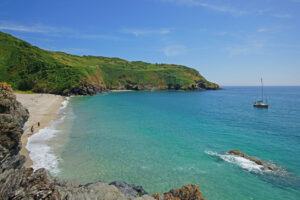 The stunning Cornish beach and coast line of Lantic Bay near Polruan on a beautiful summer day, Cornwall, England, UK