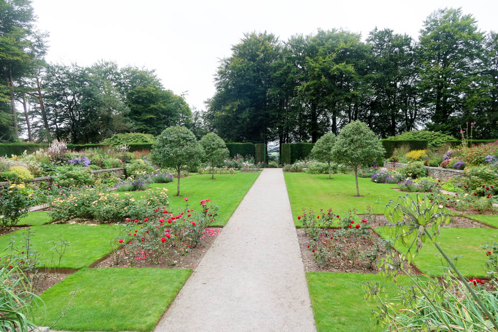 Shot of the gardens at Castle Drogo, with a footpath running through 