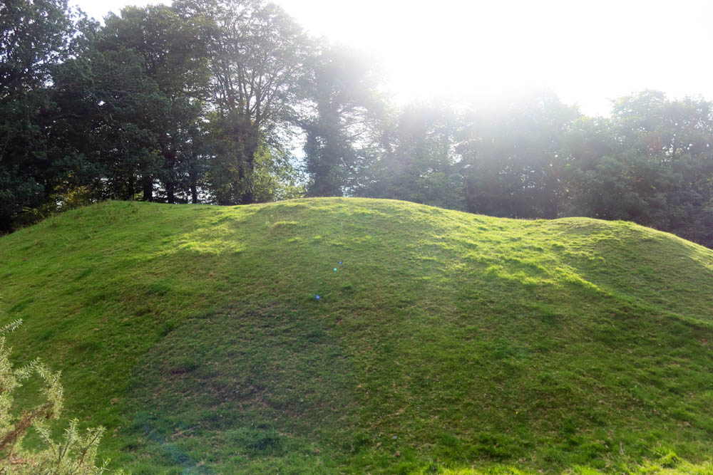 A mound of earth, which was once a historic Norman Castle in Lydford, Dartmoor, England