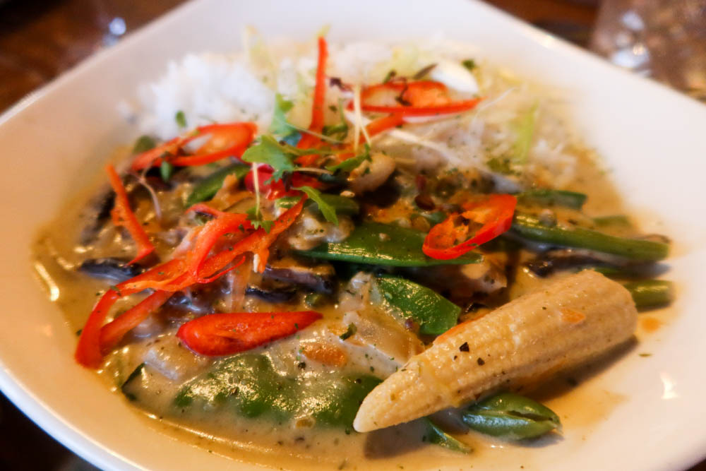 Veggie Thai green curry with white rice and baby corn