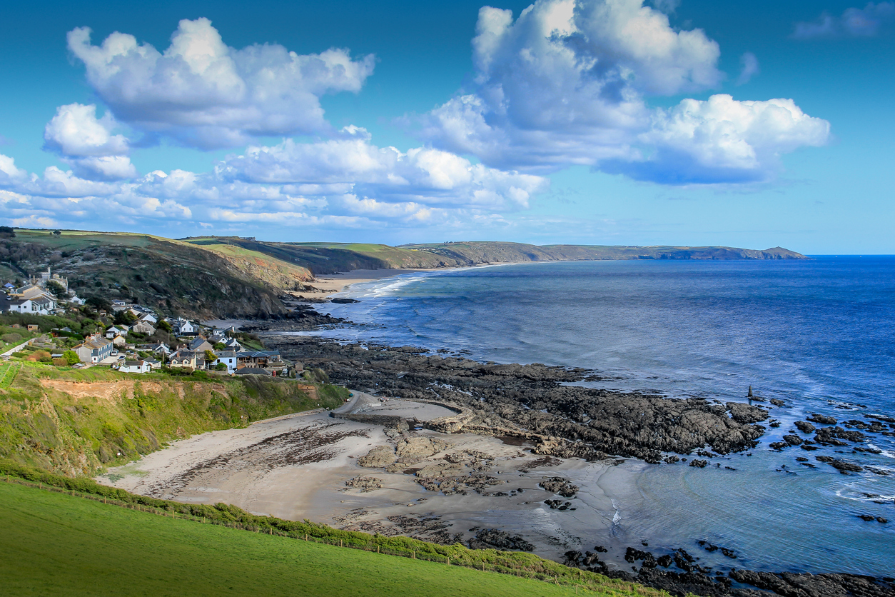 Elevated View of Portwrinkle, with views across Whitsand Bay towards Rame Head in Cornwall, UK