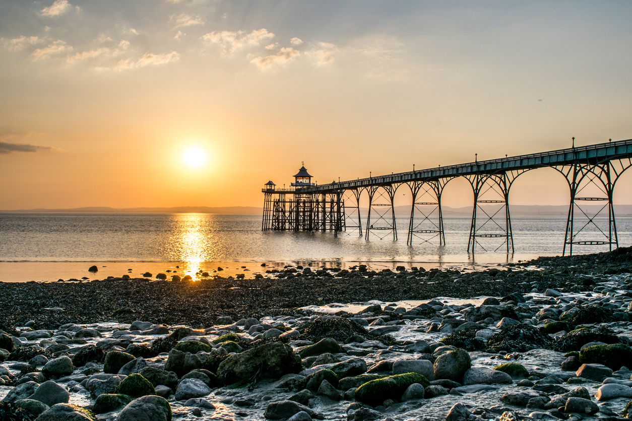 Clevedon Pier in Somerset , England as the sun sets