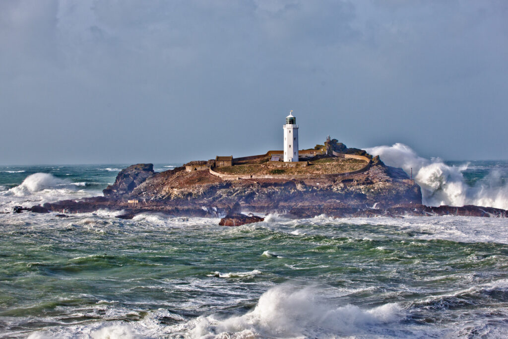 The Lighthouse at Gwithian, in Cornwall during one of the many storms during the winter of 2013-14. You can see the waves crashing over the island and the lighthouse. 
