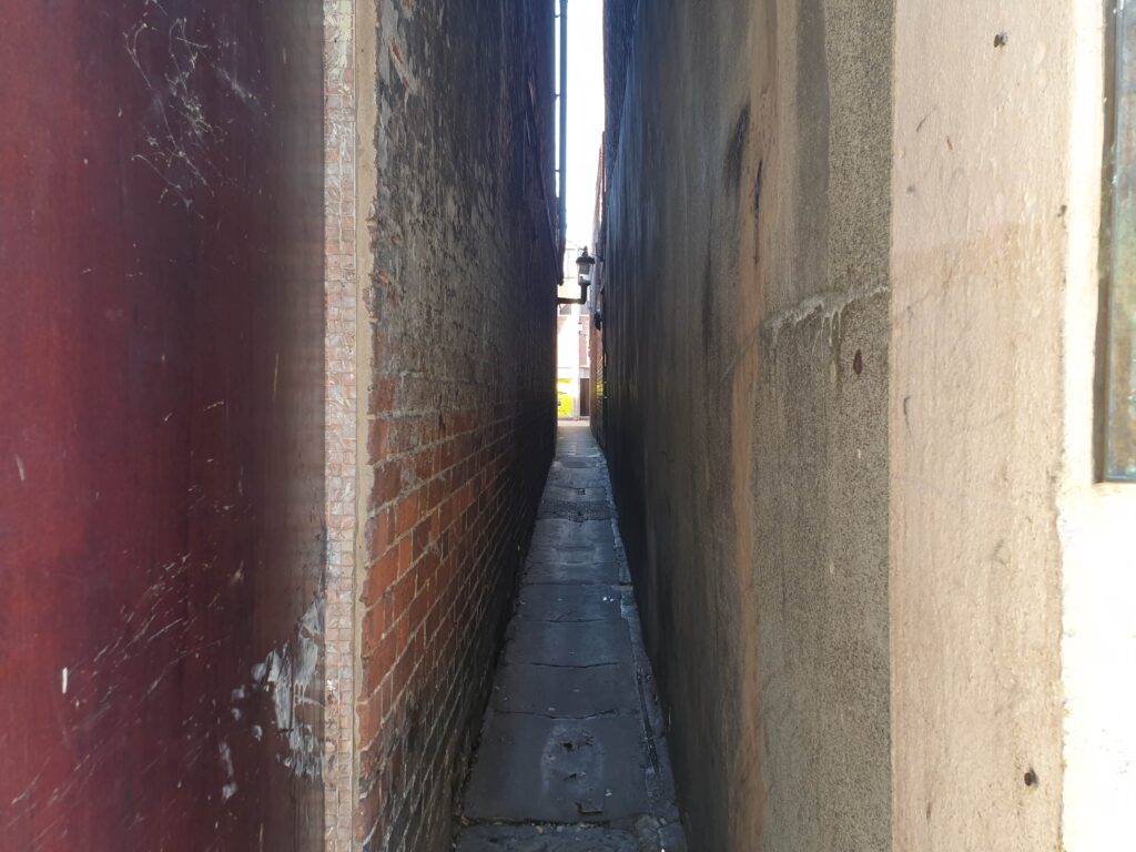 a shot of one of the narrowest streets in the world