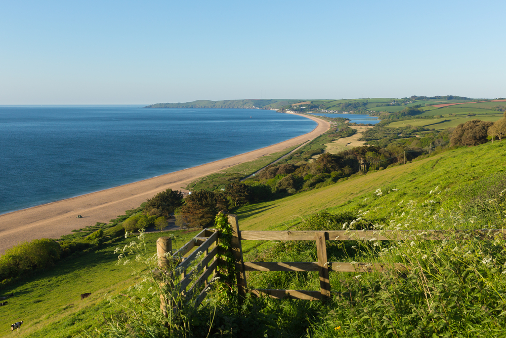 Slapton Sands in Devon,a spit of sand with a freshwater lake behind.