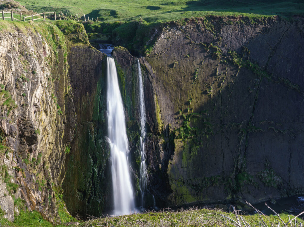 Speke's Mill Mouth waterfall near Hartland Quay in North Devon, England