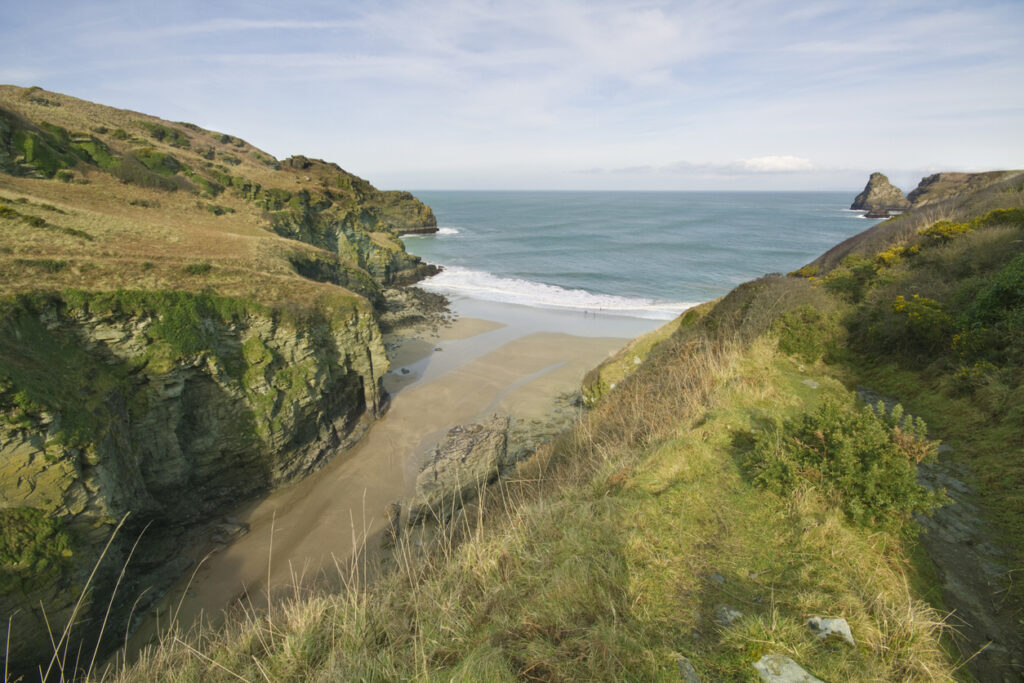 Bossiney cove on a sunny winters day. The beach is located on the north coast of Cornwall close to Tintagel and is a popular destination for tourist and vistors.