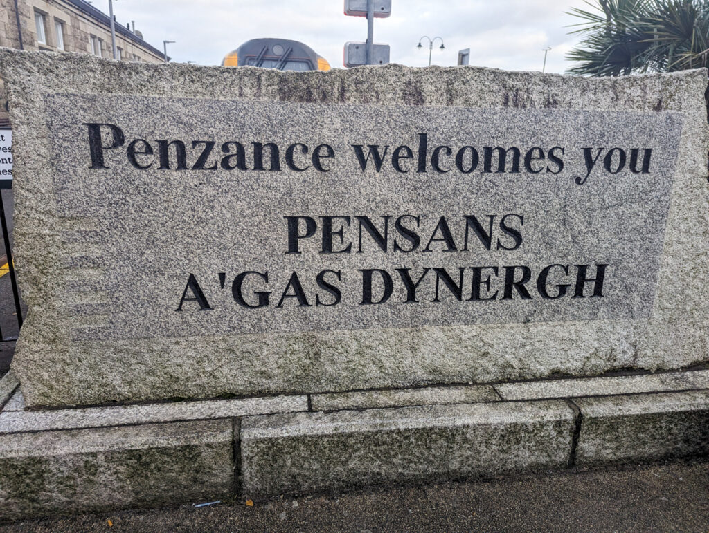 Welcome to Penzance sign at the station here