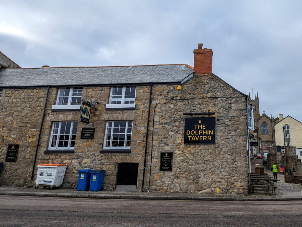 Outside of the Dolphin Tavern, a stone building in Penzance that's a popular place to eat and stay.